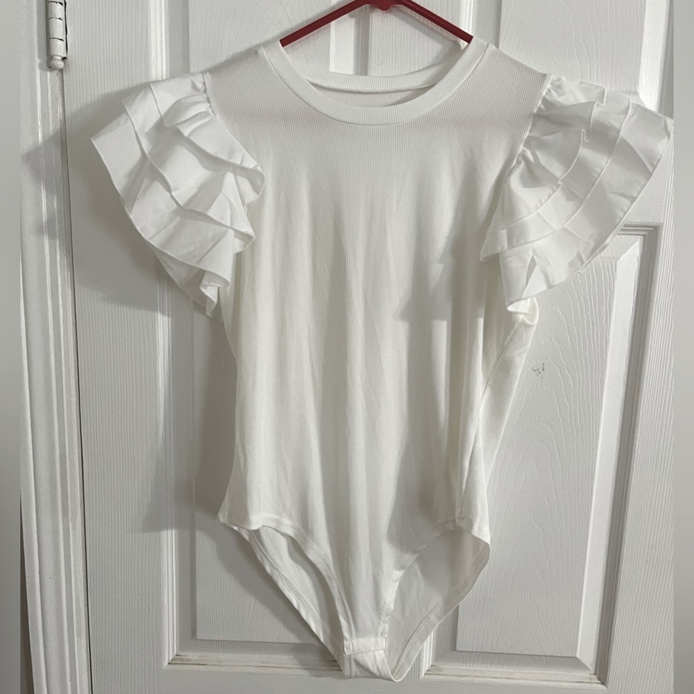 White knit bodysuit with wide ruffles